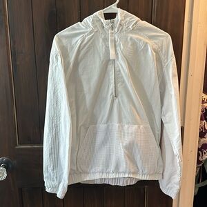 white zip up windbreaker